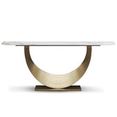 Celestia Console Table featuring a sculptural golden base and sintered stone surface with soft marble veining.