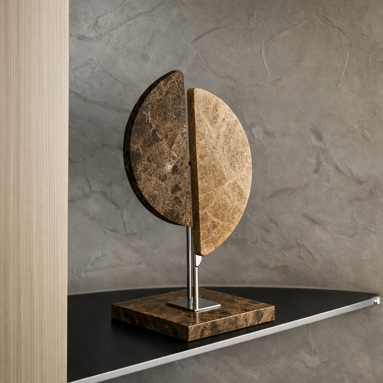 Roche Marble Sculpture displayed on a shelf, showcasing its bi-tonal design and polished marble finish.