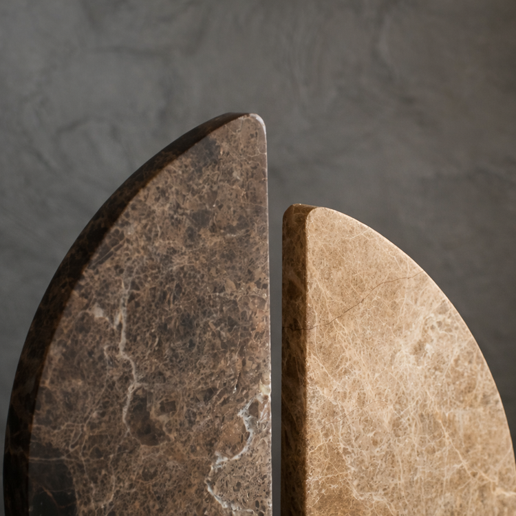 Roche Marble Sculpture showcasing polished bi-tonal marble textures in a modern design.