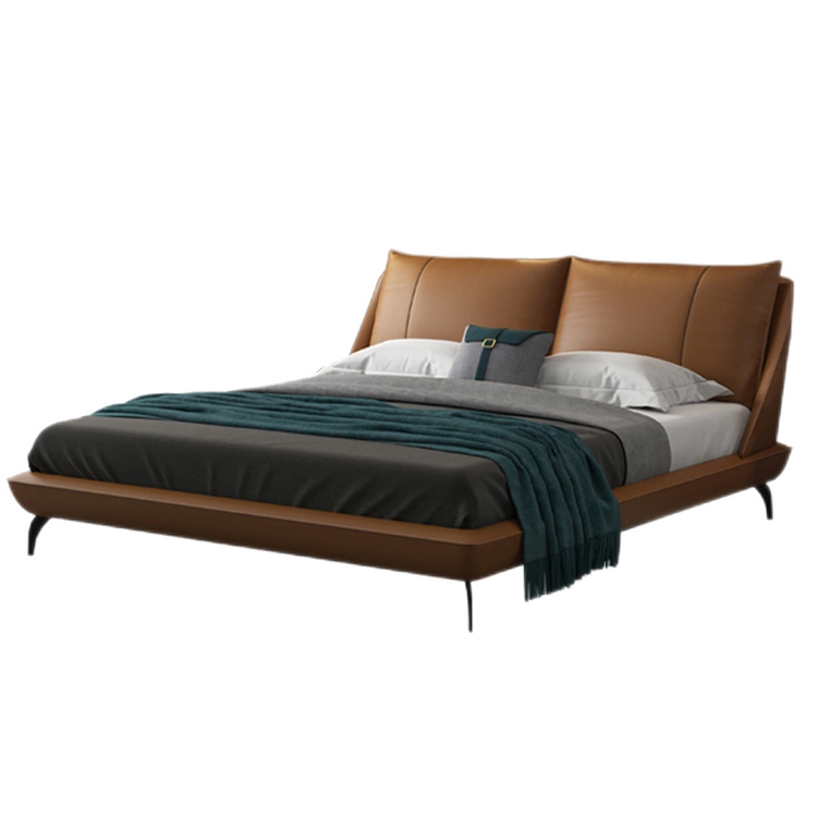 Ardelle Bed featuring smooth caramel vegan leather and a gently curved padded headboard in a modern bedroom setting.